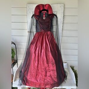 HALLOW’S EVE, GIRLS WITCH COSTUME.LONG DRESS WITH HOOP,IN RED/BLACK.SIZE S(7-8)
